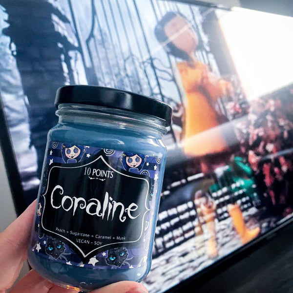 Coraline - Soy Candle  Scent Notes: Peach, SUgarcan, Caramel & Musk